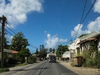 Another shot of the roads around Marigot. In this case the road is in pretty good shape but the buildings aren&#39;t exactly palatial. There seemed to be quite a disparity between wealth and poverty on the island but I guess that&#39;s not unusal on a small island heavily dependant on tourism.